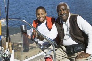 Carefree Boat Club Grandfather Taking Grandson Fishing in Boat  