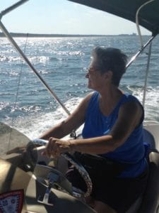 Mary Ann at the helm