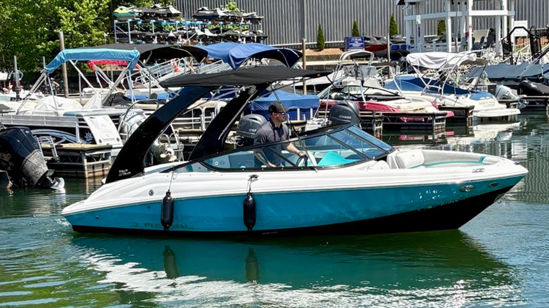 https://carefreeboats.com/wp-content/uploads/2025/06/norman-exiting-marina-1920x1080-1.webp